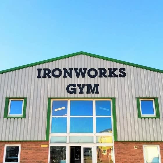 The Ironworks Gym building on Europa Way, with large IRONWORKS GYM lettering on the front under a blue sky